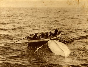 A photo of Titanic survivors paddling to shore