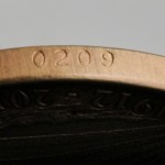 titanic coal coin - side view